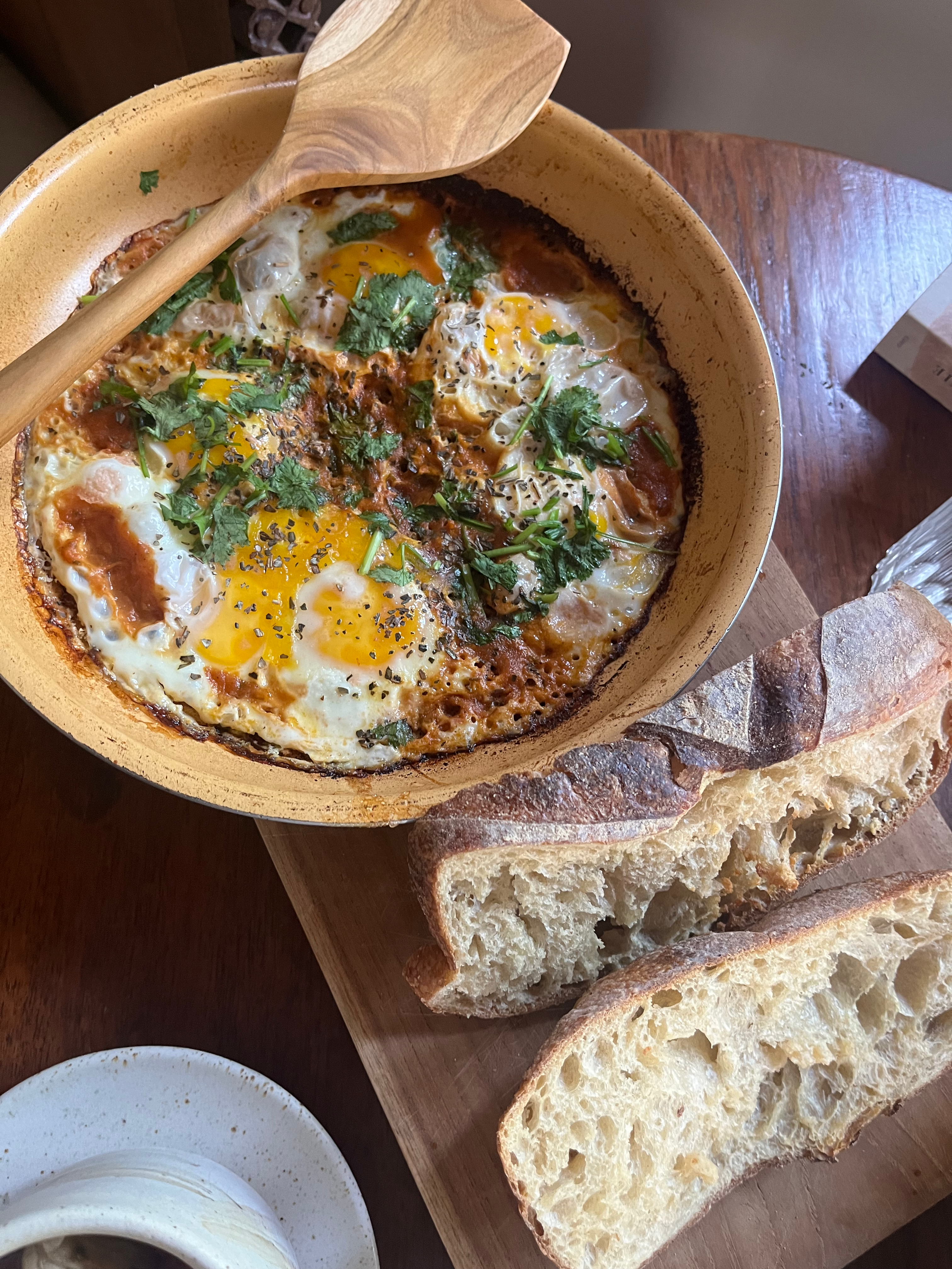Shakshuka Eggs with Coriander and Minted Cucumber Yogurt